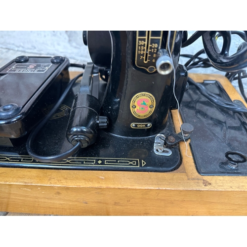 204 - Two Vintage Electric Singer Sewing Machines