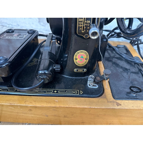 204 - Two Vintage Electric Singer Sewing Machines