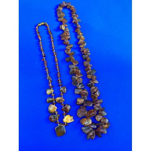 21 - Two Baltic Amber Necklaces