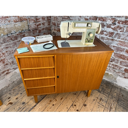 400 - Mid Century Type Cabinet with Toyota Sewing Machine and Spares and Accessories