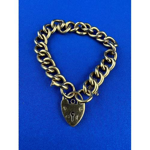 19 - 9CT Gold Curb Link Bracelet with Heart Shape Locket 18.4g 18cm Long
