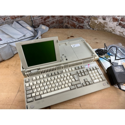 319 - Vintage Amstrad PPC512 Portable Personal Computer. Boots Up, Needs Disk,Not PAT Tested.