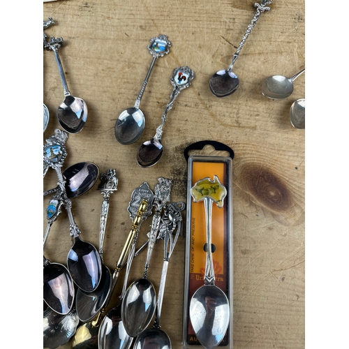 89 - Souvenir & Collectible Spoons including 800 Silver.