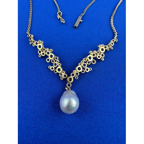16 - 14ct 585 Gold Necklace with Pearl. 10.7g Gross