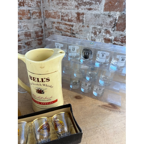 377 - Box of Collectable Glasses & Whiskey Jug with Leeds United Shot Glasses