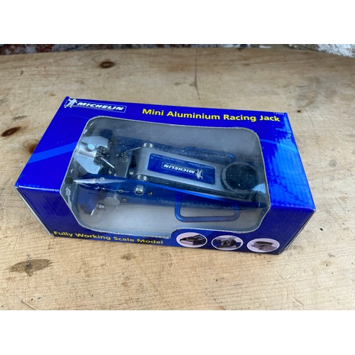 154 - Michelin Fully Working Scale Model Racing Jack. Boxed as new.