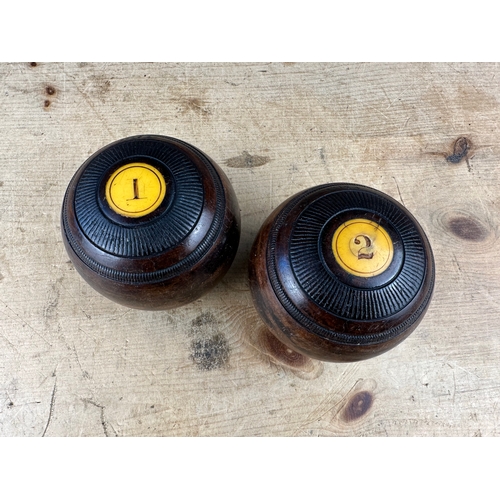 129 - Two Antique Lignum Vitae Bowls