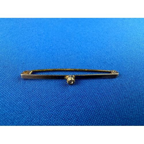 60 - 9ct Gold Bar Brooch set with Small Old Cut Diamond 1.37g gross.