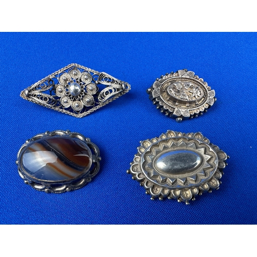 8 - Four Silver Brooches