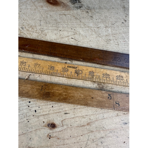 137 - Three Vintage Yardsticks including Ridgley