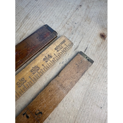 137 - Three Vintage Yardsticks including Ridgley