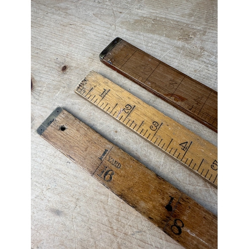 137 - Three Vintage Yardsticks including Ridgley