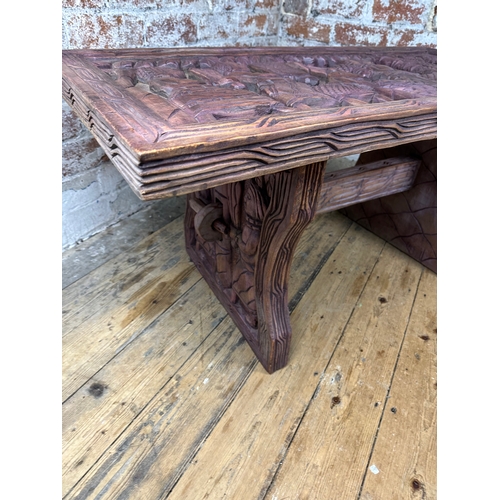 509 - Heavily Carved African Wooden Table