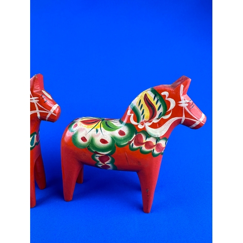 221 - A Pair of Nils Olsson Painted Horses