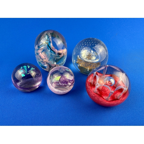 150 - Five Paperweights by Caithness etc