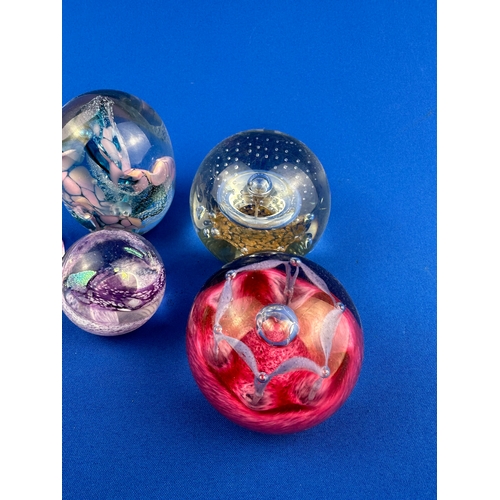 150 - Five Paperweights by Caithness etc