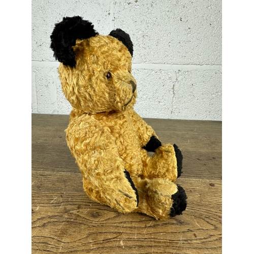 116 - Vintage Glass-Eyed Teddy Bear with Articulated Limbs and Head. 12