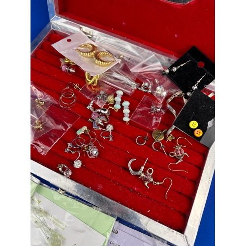 94 - Quantity of Earrings in White Metal Horse Design Box