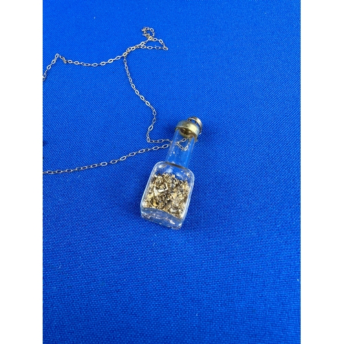 27 - 9ct Gold Chain withGold Flake Pendant