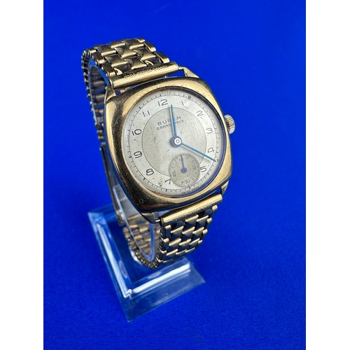 73 - 9ct Buren Grand Prix Wristwatch - Wporking. over 9g of 9ct in Case, Nice Rolled Gold Strap.