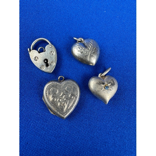 53 - Four Silver Heart Shape Pendants