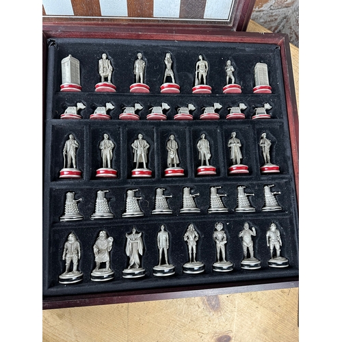 126 - Danbury Mint - Dr Who chess set, housed in wooden case, pewter pieces, the forces of Good V Evil, co... 