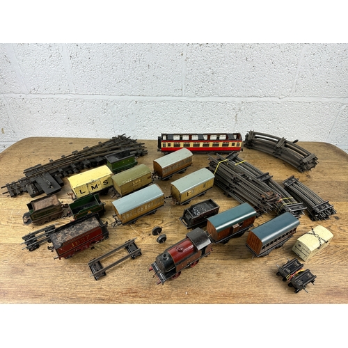 99 - Collection of Hornby and other Tinplate O Gauge Rolling Stock, Clockwork Engine and Track