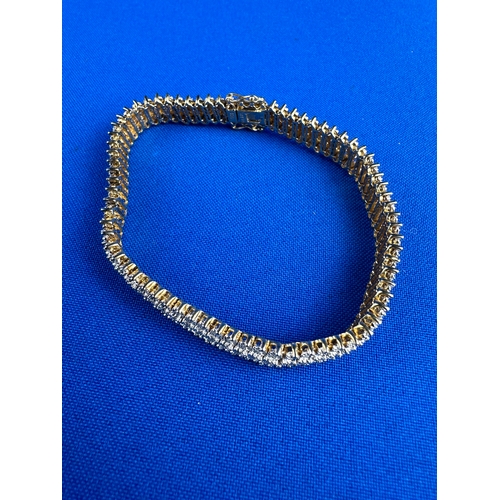 69 - 9ct Gold and Diamond (225 small stones) Bracelet 19cm long 17.7g gross