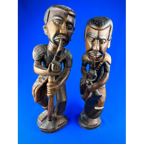 301 - Two Carved Wooden Figures approximately 50cm tall.