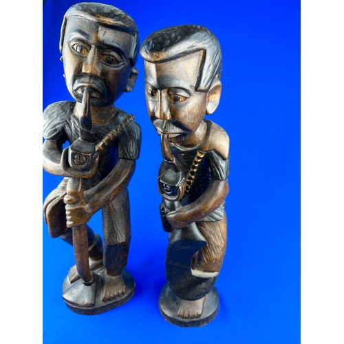 301 - Two Carved Wooden Figures approximately 50cm tall.