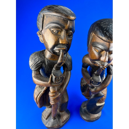 301 - Two Carved Wooden Figures approximately 50cm tall.