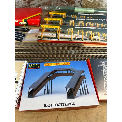 191 - Hornby 00 Gauge Track, Over Head Power Packs & Other Trackside Items