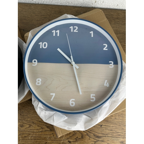 231 - Two As New and Boxed Contemporary Wall Clocks