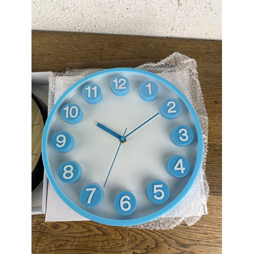 232 - Two As New and Boxed Contemporary Wall Clocks