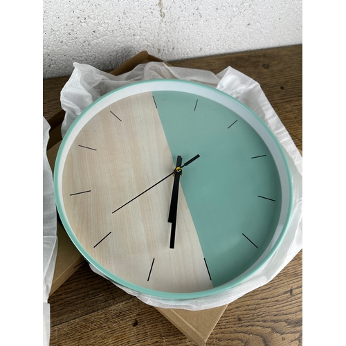 234 - Two As New and Boxed Contemporary Wall Clocks