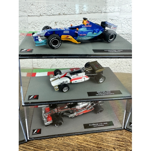 205 - 10 Panini 1:43 Scale Formula 1 Cars From Different Decades  - Lot 2 of 10