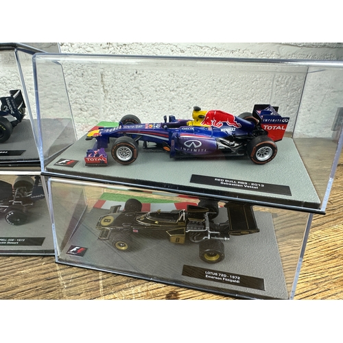 207 - 10 Panini 1:43 Scale Formula 1 Cars From Different Decades  - Lot 4 of 10