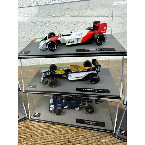 207 - 10 Panini 1:43 Scale Formula 1 Cars From Different Decades  - Lot 4 of 10