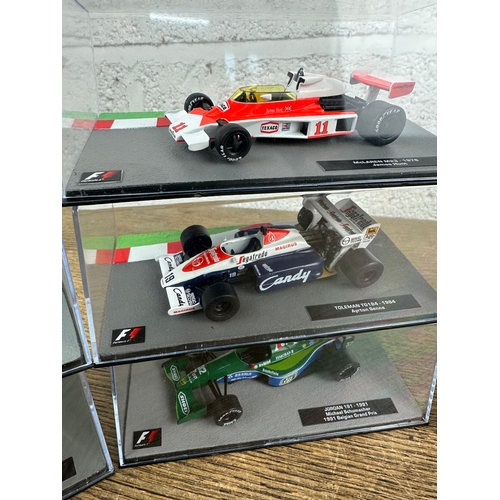 207 - 10 Panini 1:43 Scale Formula 1 Cars From Different Decades  - Lot 4 of 10