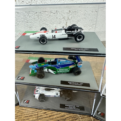 208 - 10 Panini 1:43 Scale Formula 1 Cars From Different Decades  - Lot 5 of 10