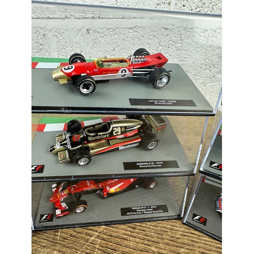 208 - 10 Panini 1:43 Scale Formula 1 Cars From Different Decades  - Lot 5 of 10