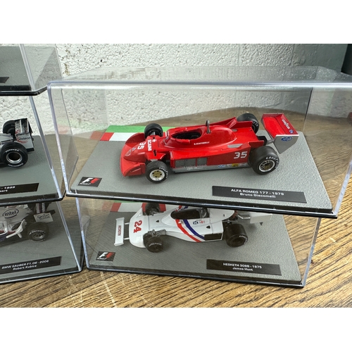 209 - 10 Panini 1:43 Scale Formula 1 Cars From Different Decades  - Lot 6 of 10