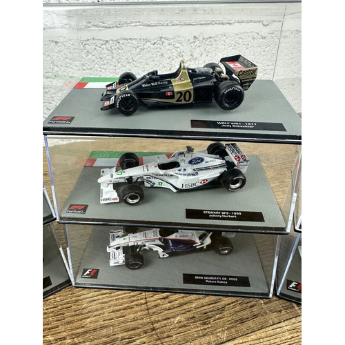 209 - 10 Panini 1:43 Scale Formula 1 Cars From Different Decades  - Lot 6 of 10