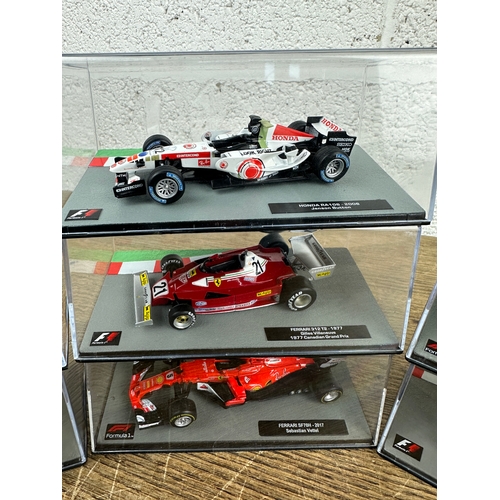 209 - 10 Panini 1:43 Scale Formula 1 Cars From Different Decades  - Lot 6 of 10