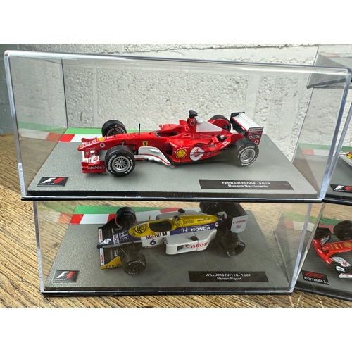 209 - 10 Panini 1:43 Scale Formula 1 Cars From Different Decades  - Lot 6 of 10