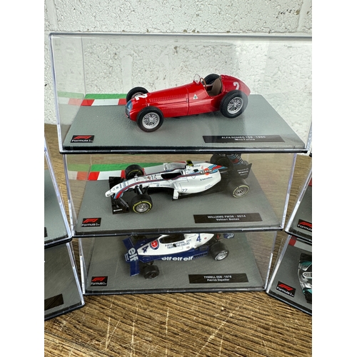 211 - 10 Panini 1:43 Scale Formula 1 Cars From Different Decades  - Lot 8 of 10