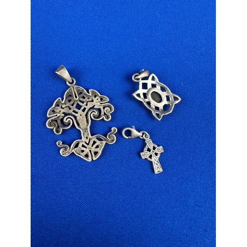 28 - Three Silver Celtic Pendants