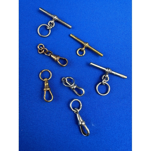 369 - Antique Dog Clips & T-Bars