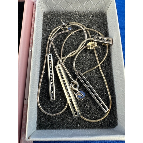 82 - Two Boxed Silver Necklace & Earring Sets