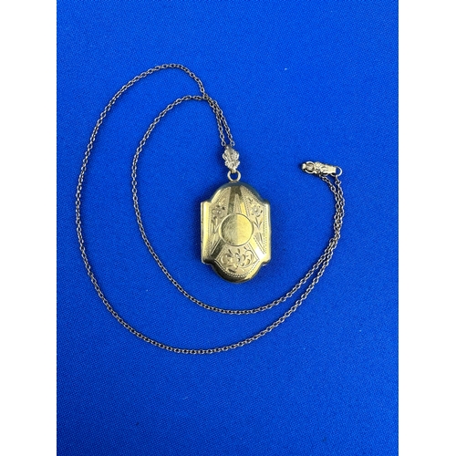 83 - Engraved Rolled Gold Locket & Chain